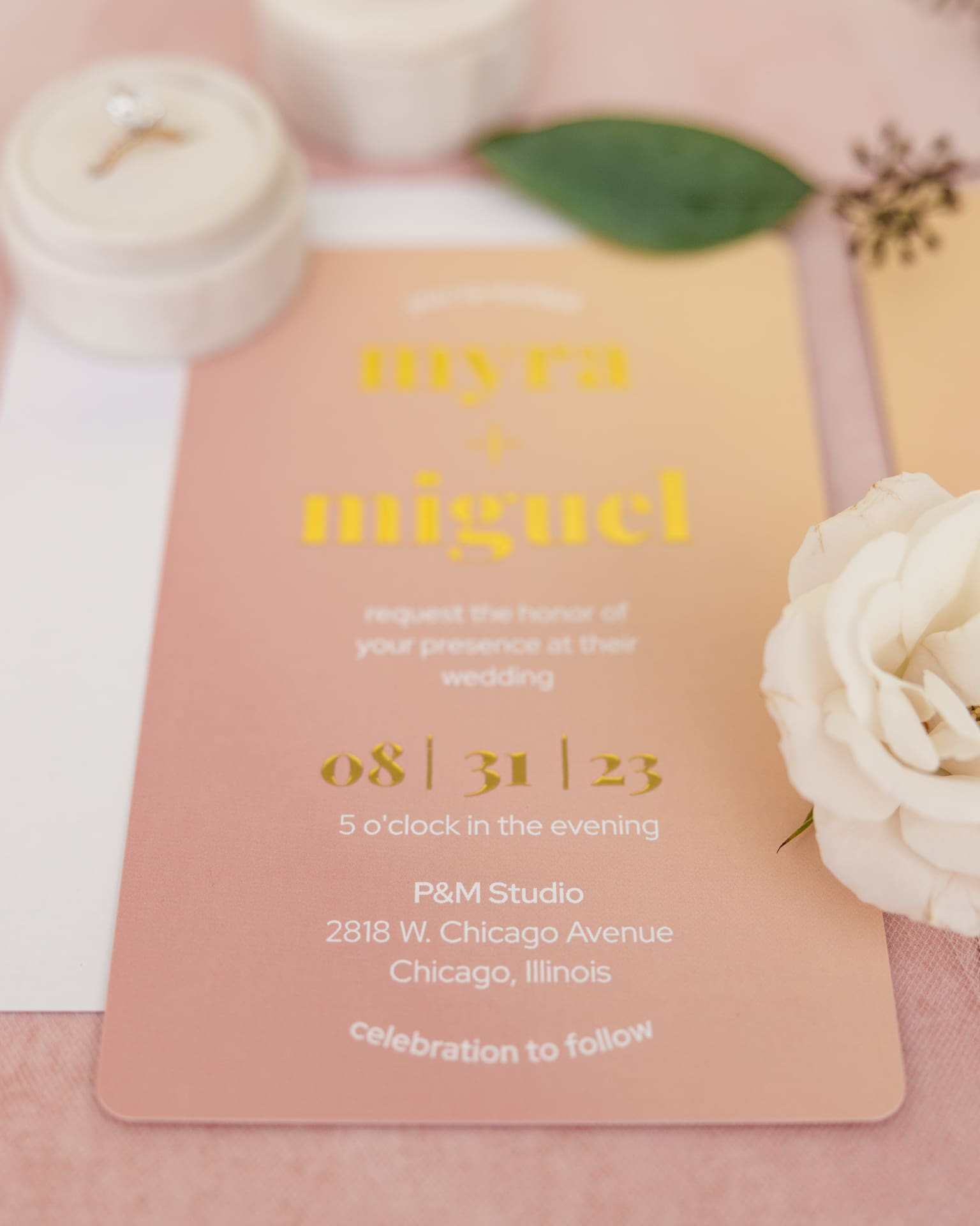 Detail photo of summer invitation in pink and gold for intimate wedding ceremony at at P&M Studio Chicago event space