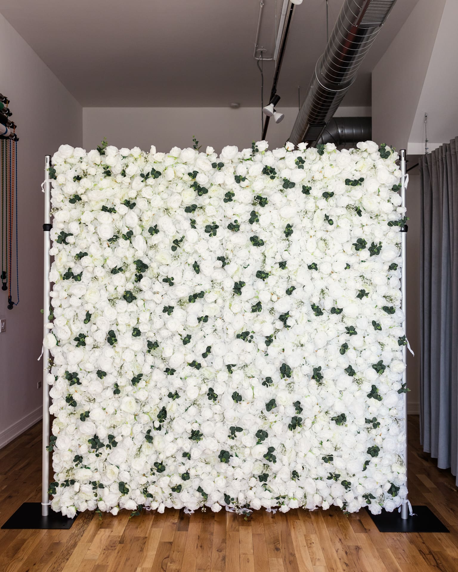 White rose flower wall set up in Chicago photography studio P&M Studio